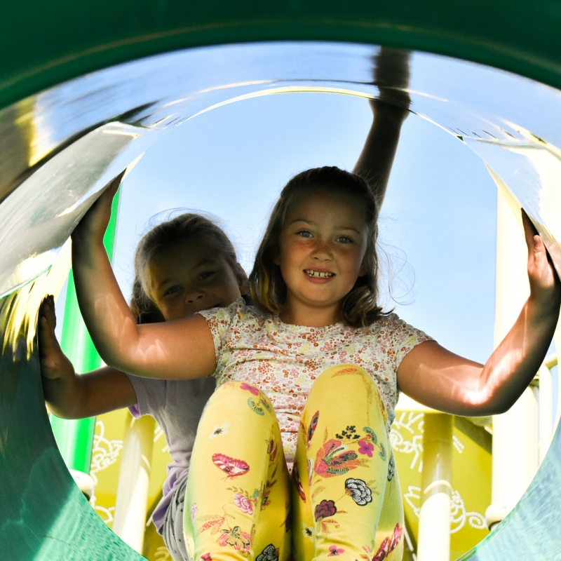 Two girls on slide