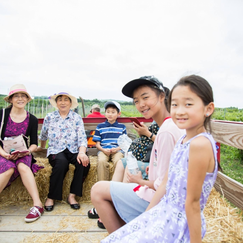 family on hay rack